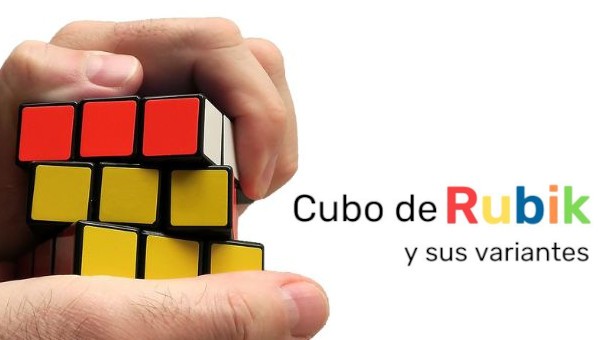 Dos manos juengan con un cubo de Rubik