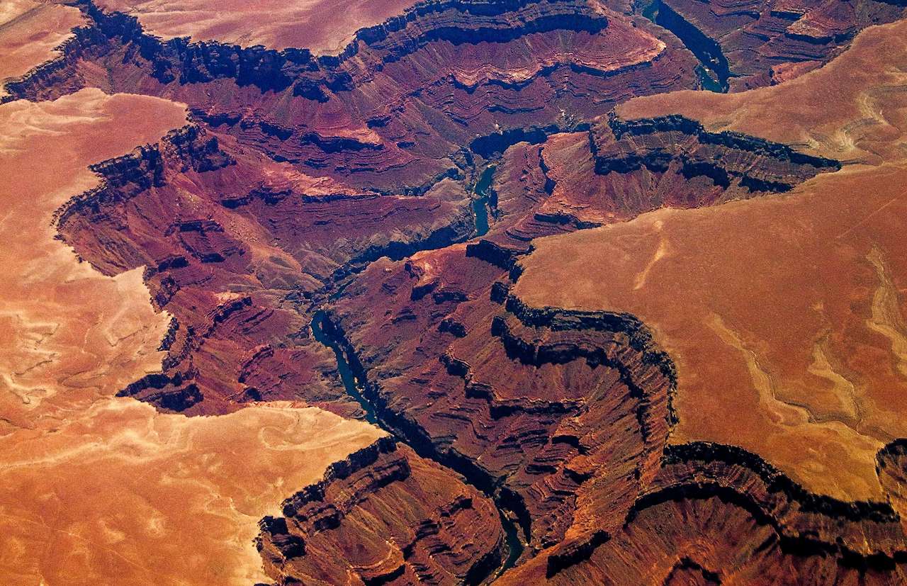 hile the Colorado Plateau was uplifted. While the specific geologic processes and timing that formed the Grand Canyon are the subject of debate by geologists, recent evidence suggests the Colorado River established its course through the canyon at least 17 million years ago. Since that time, the Colorado River continued to erode and form the canyon to its present-day configuration. AFP PHOTO/JOE KLAMAR