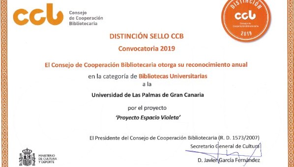 Diploma con el texto: «El Consejo de Cooperación Bibliotecaria otorga su reconocimiento anual en la categoría de Bibliotecas Universitarias a la Universidad de Las Palmas de Gran Canaria por el proyecto "Espacio Violeta"»